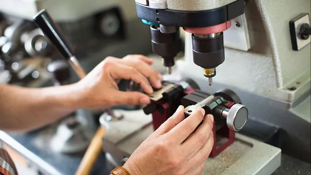 one of our team cutting a key for a customer